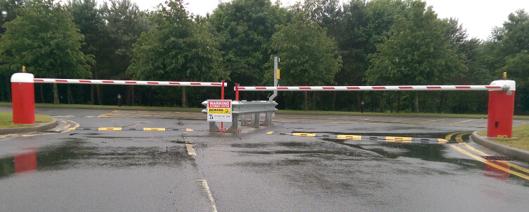 Two Red School Entrance Traffic Barriers